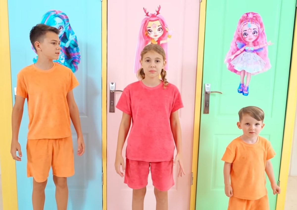Kids creators standing in front of pastel doors with Rainbow High characters